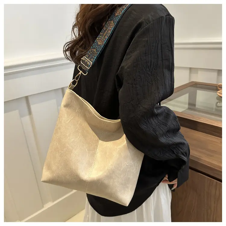 Brown Leather Ethnic Shoulder Bag with Crossbody Strap — feature 10