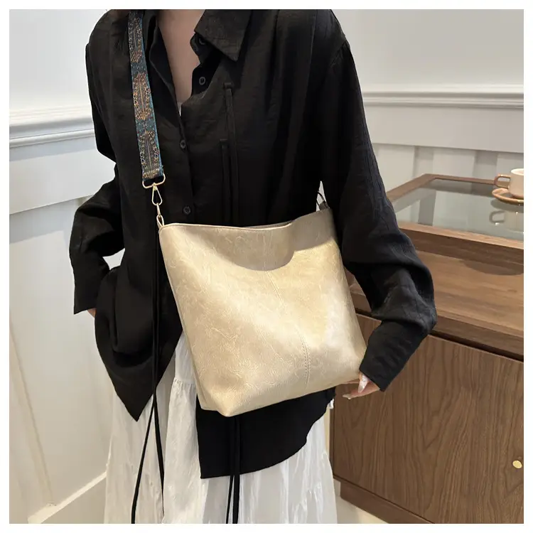 Brown Leather Ethnic Shoulder Bag with Crossbody Strap — feature 12
