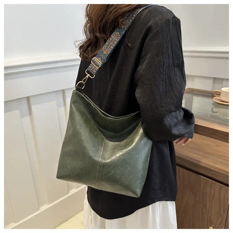 Brown Leather Ethnic Shoulder Bag with Crossbody Strap — feature 13