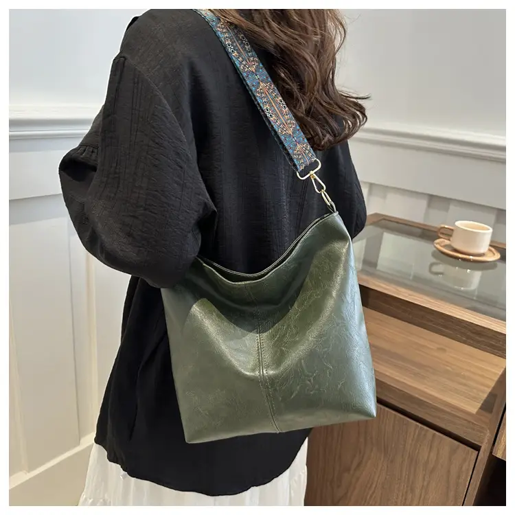 Brown Leather Ethnic Shoulder Bag with Crossbody Strap — feature 14