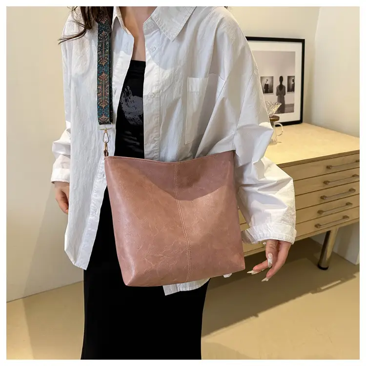 Brown Leather Ethnic Shoulder Bag with Crossbody Strap — feature 18