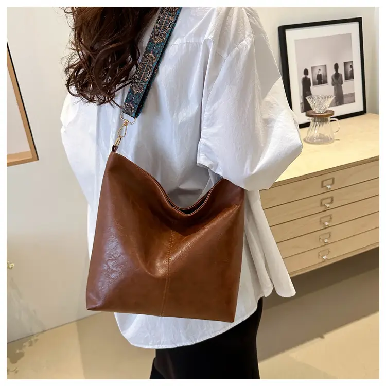 Brown Leather Ethnic Shoulder Bag with Crossbody Strap — feature 19