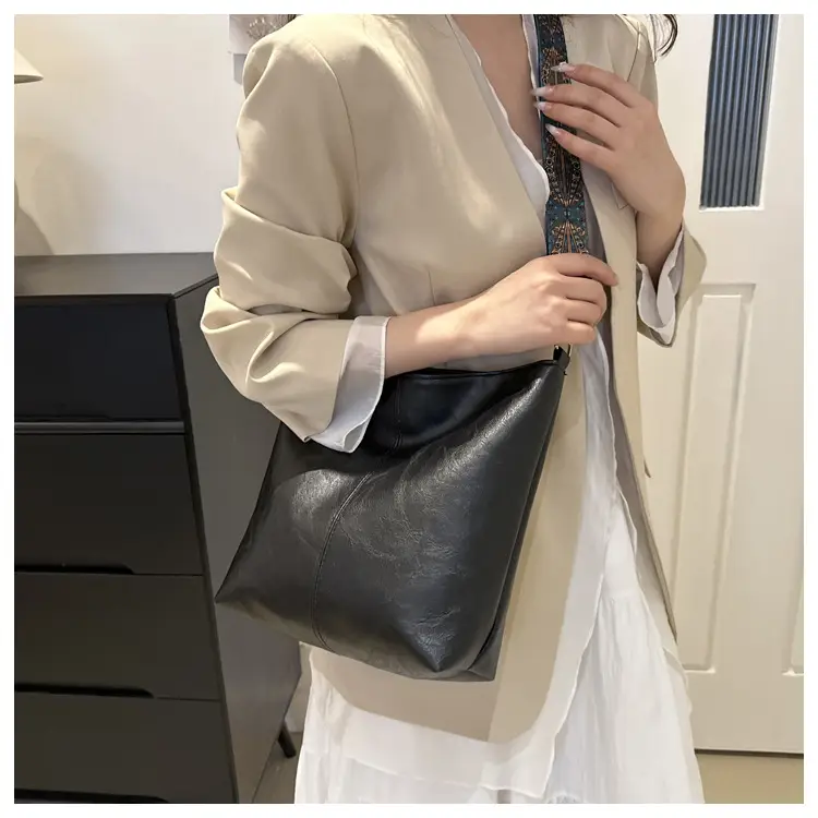 Brown Leather Ethnic Shoulder Bag with Crossbody Strap — feature 23