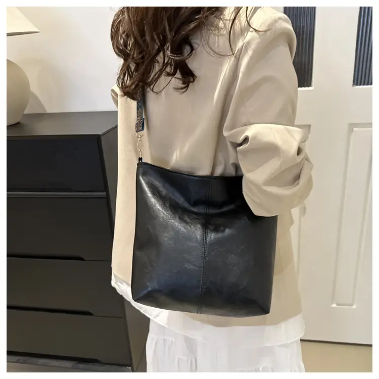 Brown Leather Ethnic Shoulder Bag with Crossbody Strap — feature 24