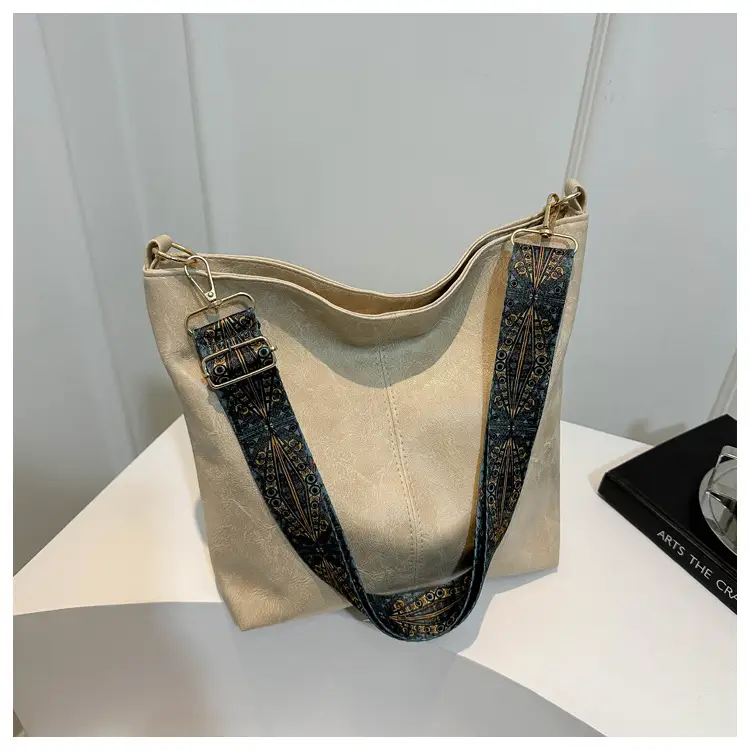 Brown Leather Ethnic Shoulder Bag with Crossbody Strap — feature 27