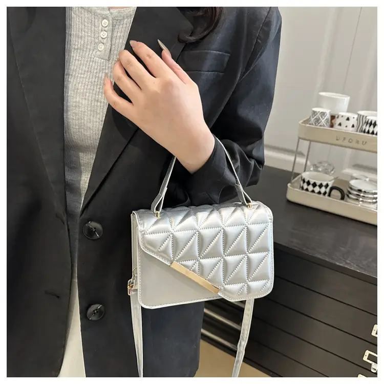 Black Quilted Shoulder Messenger Bag with Gold Plated Clasp — feature 19