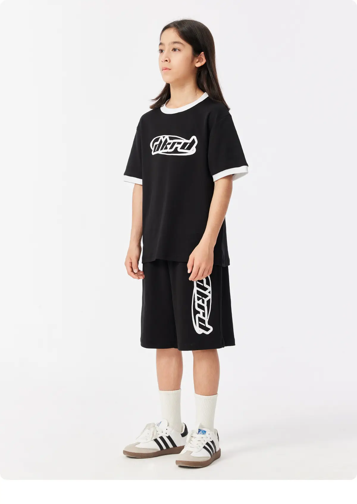 Black DK Kids Shorts with Graphic Print — feature 16
