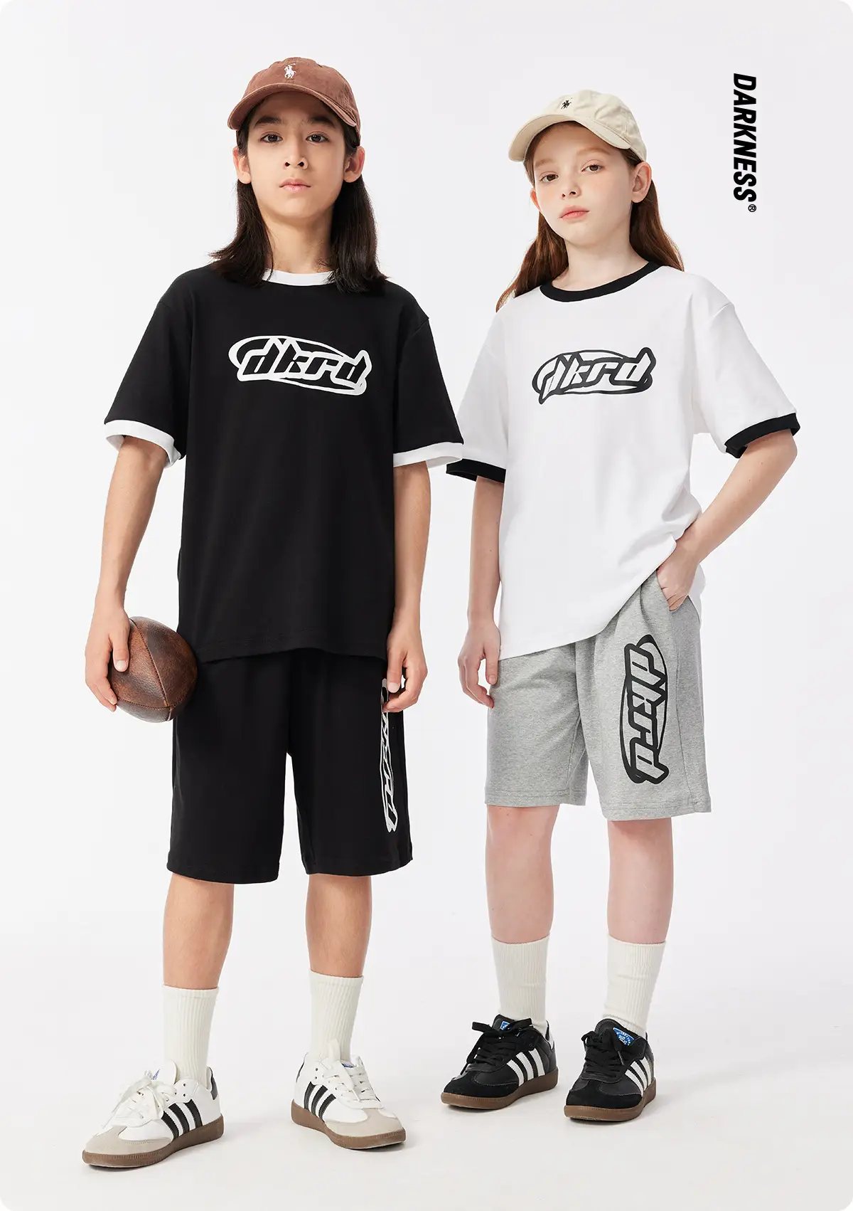 Black DK Kids Shorts with Graphic Print — feature 3