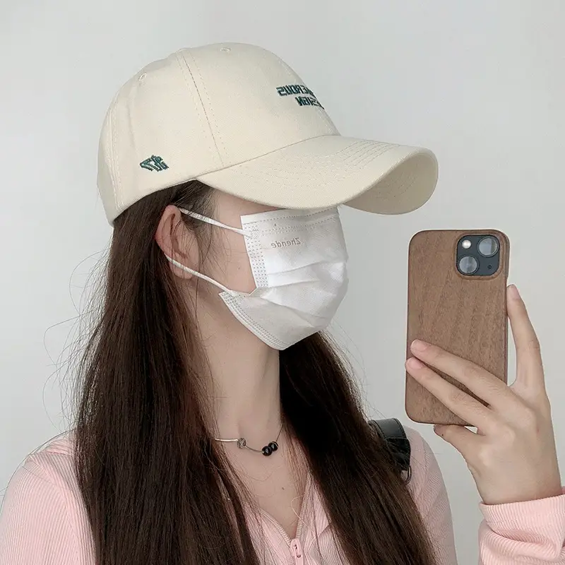 Beige Women's Curved Eaves Baseball Cap with "DANGEROUS DESIGN"
