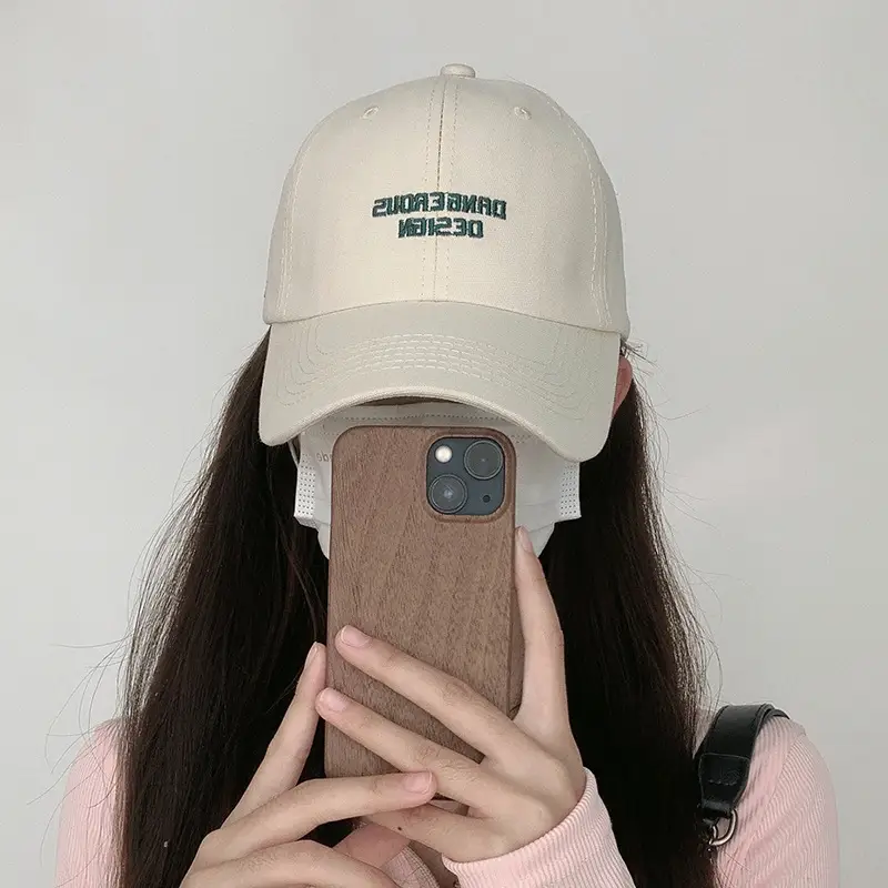 Beige Women's Curved Eaves Baseball Cap with "DANGEROUS DESIGN"