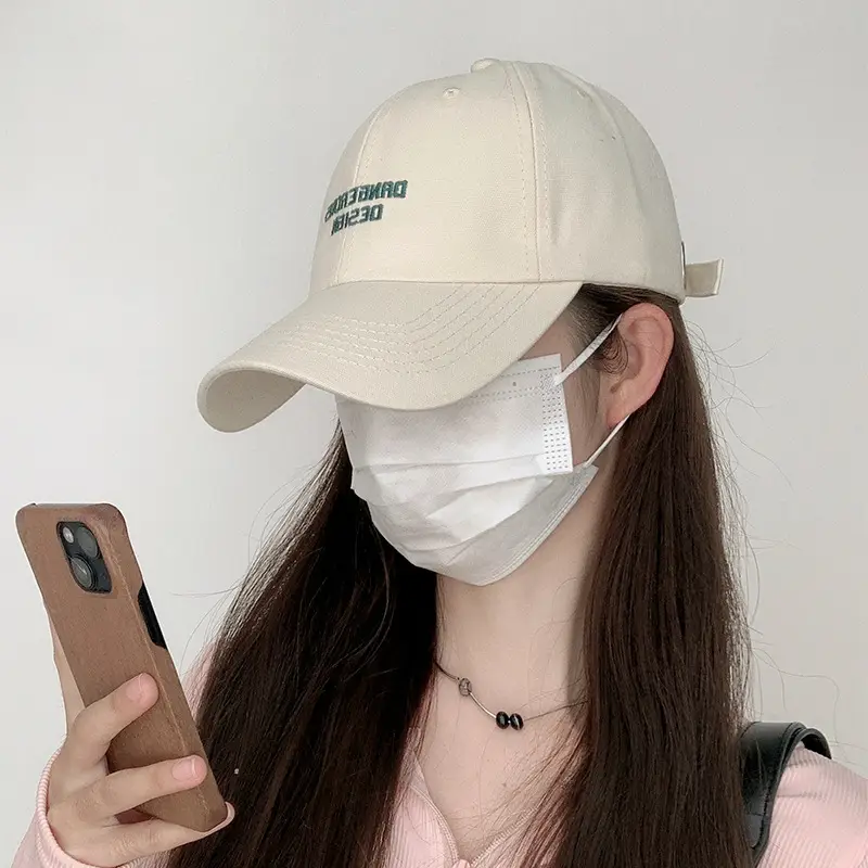 Beige Women's Curved Eaves Baseball Cap with "DANGEROUS DESIGN"
