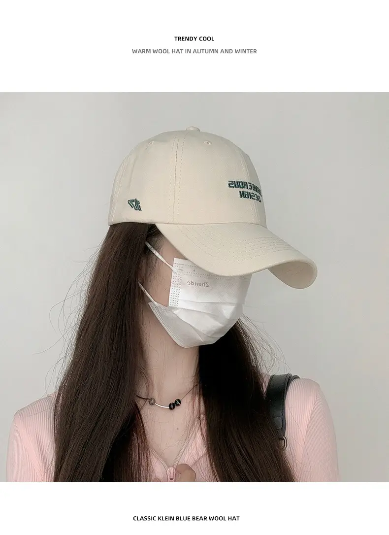 Beige Women's Curved Eaves Baseball Cap with "DANGEROUS DESIGN" — feature 6