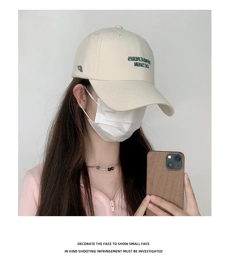 Beige Women's Curved Eaves Baseball Cap with "DANGEROUS DESIGN" — feature 7