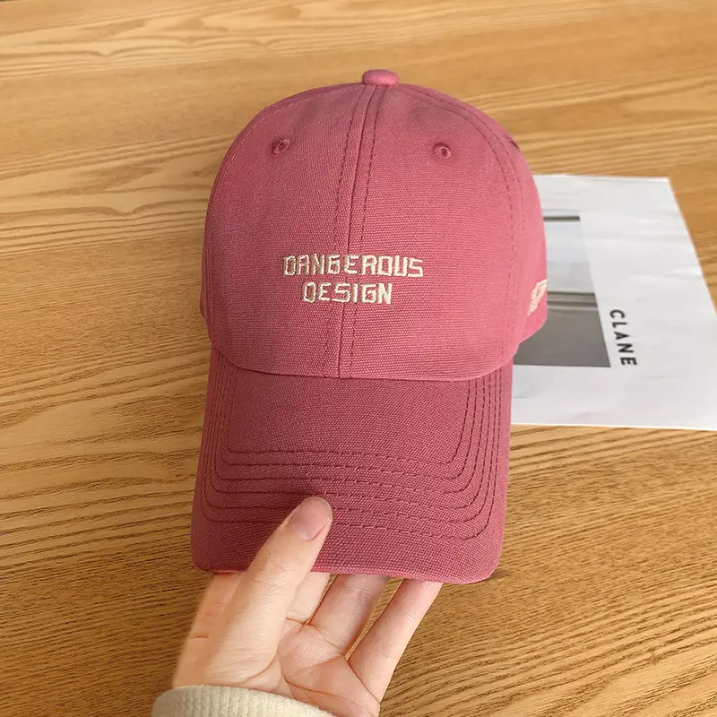 Beige Women's Curved Eaves Baseball Cap with "DANGEROUS DESIGN"