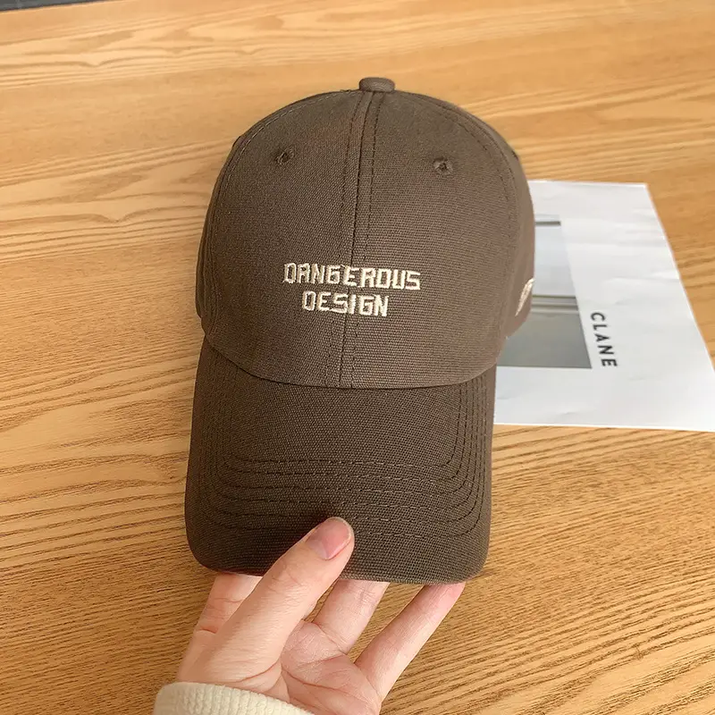 Beige Women's Curved Eaves Baseball Cap with "DANGEROUS DESIGN"