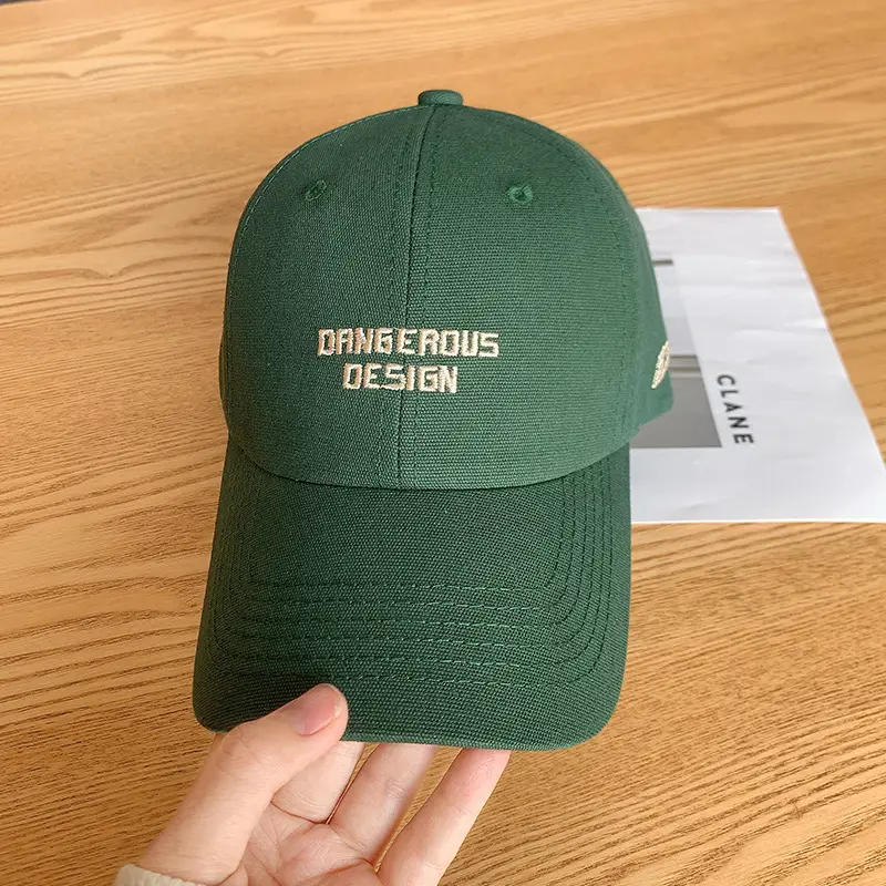 Beige Women's Curved Eaves Baseball Cap with "DANGEROUS DESIGN"