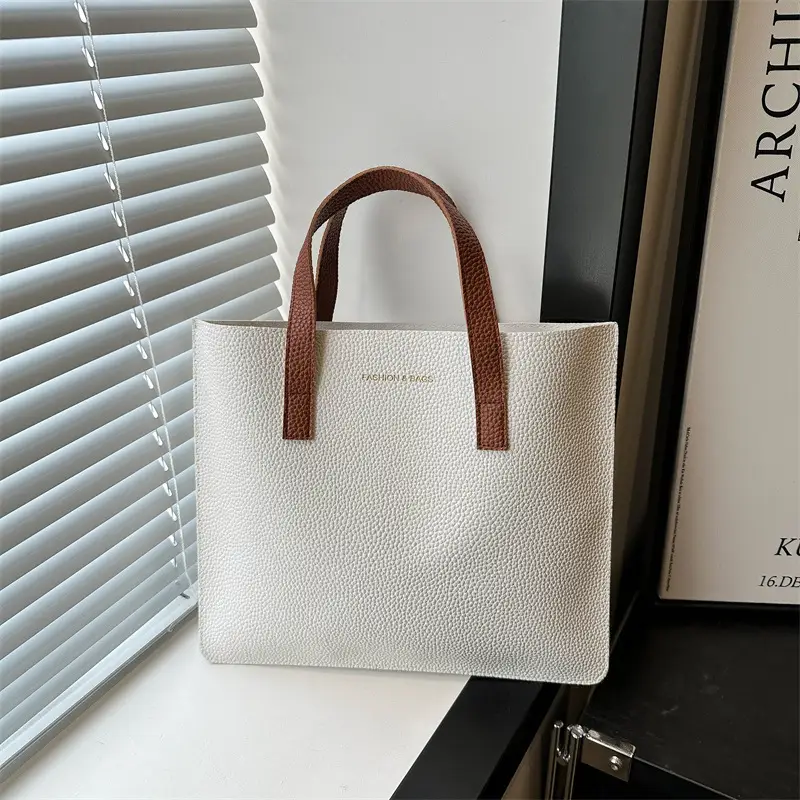 Black Leather Shoulder Bag with Brown Handles - Image 9