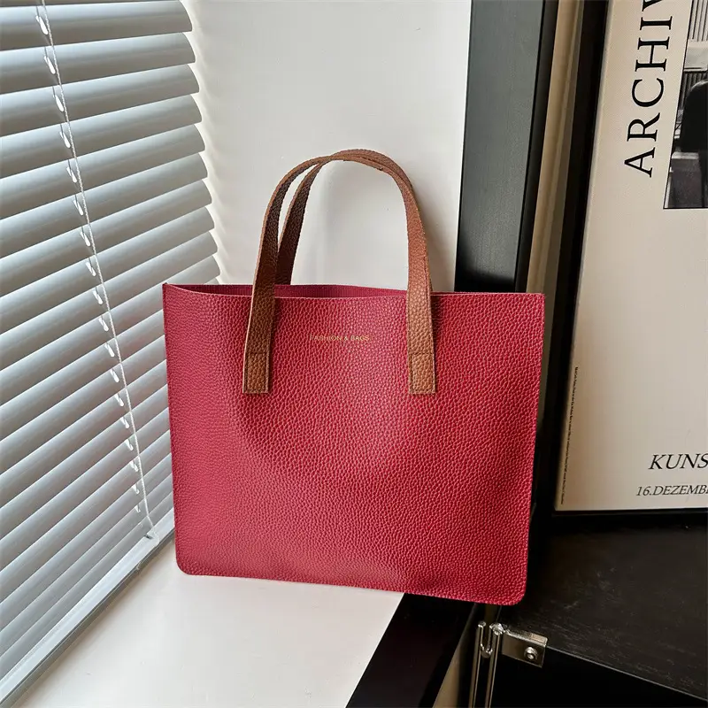 Black Leather Shoulder Bag with Brown Handles - Image 10
