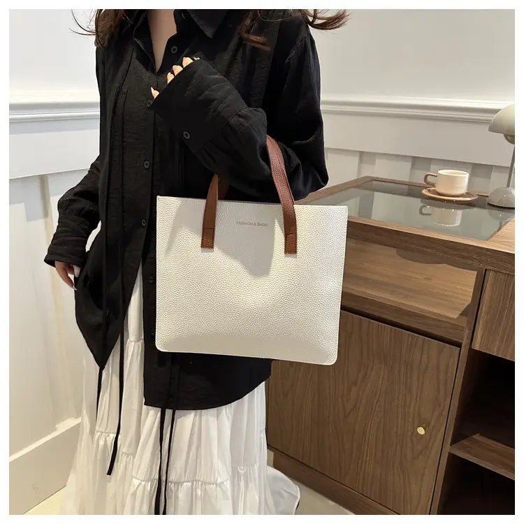 Black Leather Shoulder Bag with Brown Handles — feature 10