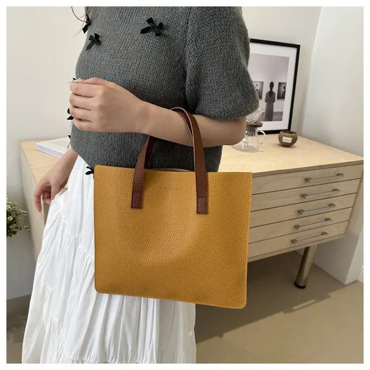 Black Leather Shoulder Bag with Brown Handles — feature 13