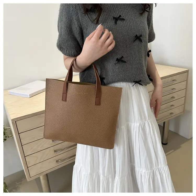 Black Leather Shoulder Bag with Brown Handles — feature 16