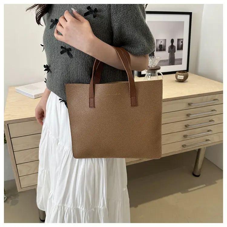 Black Leather Shoulder Bag with Brown Handles — feature 17
