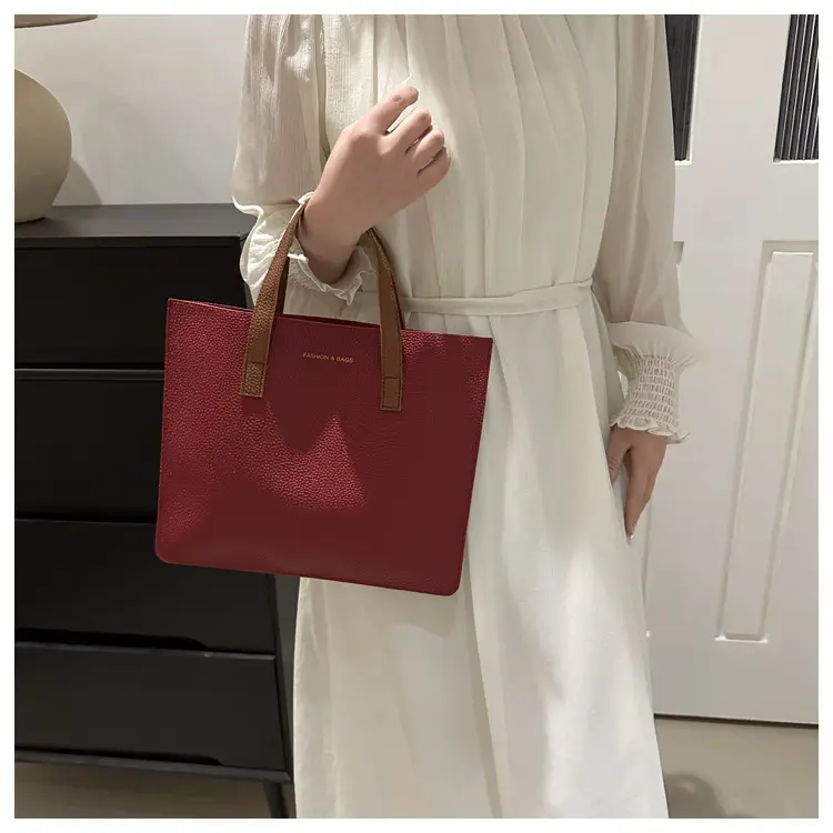 Black Leather Shoulder Bag with Brown Handles — feature 22