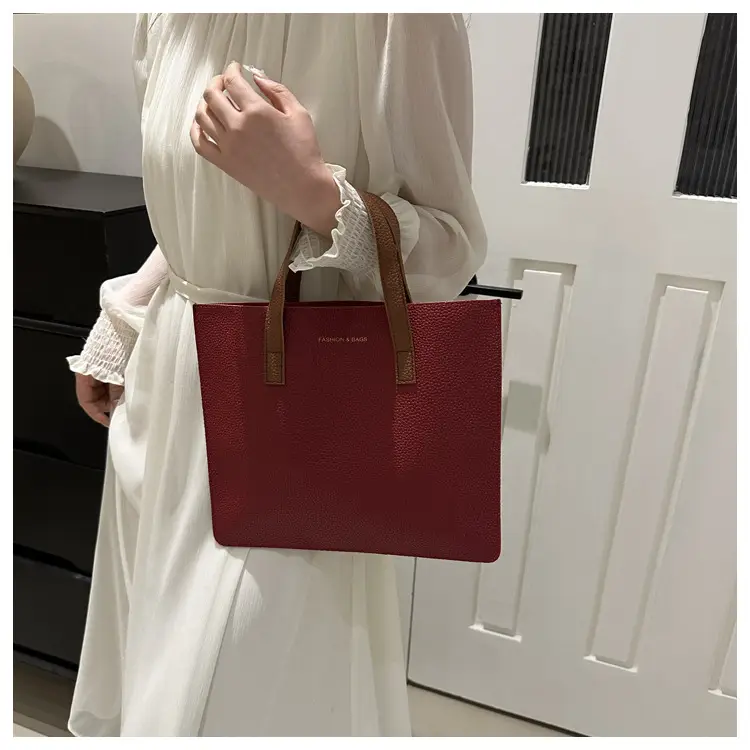 Black Leather Shoulder Bag with Brown Handles — feature 23