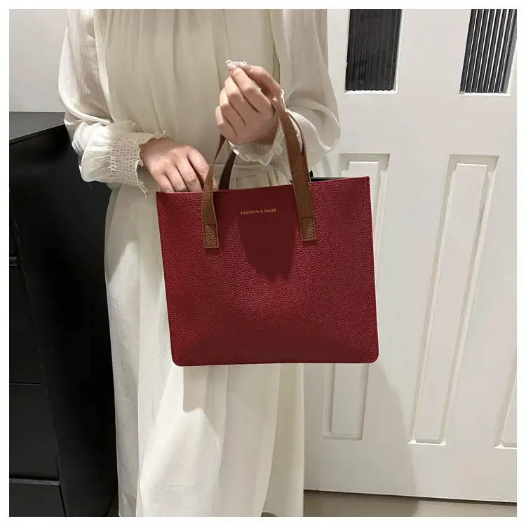 Black Leather Shoulder Bag with Brown Handles — feature 24
