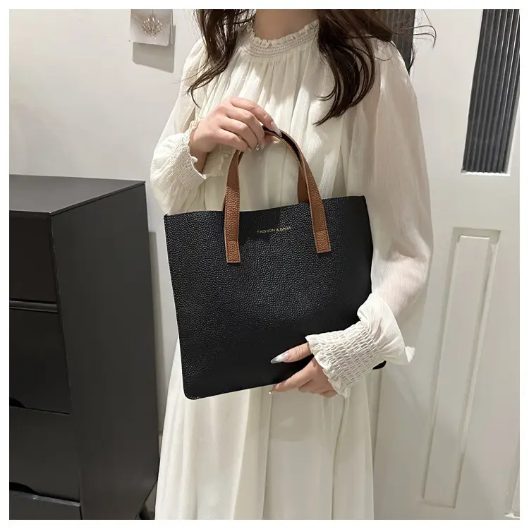 Black Leather Shoulder Bag with Brown Handles — feature 26