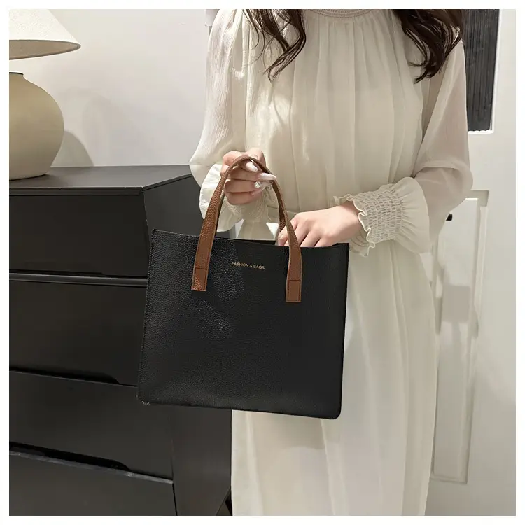 Black Leather Shoulder Bag with Brown Handles — feature 27
