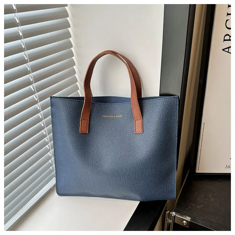 Black Leather Shoulder Bag with Brown Handles — feature 29