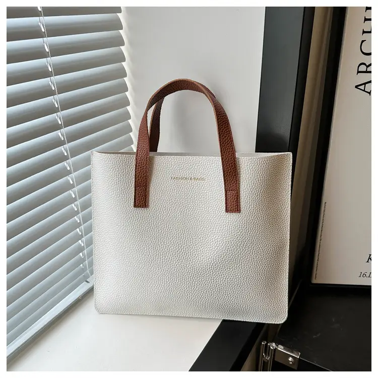 Black Leather Shoulder Bag with Brown Handles — feature 33