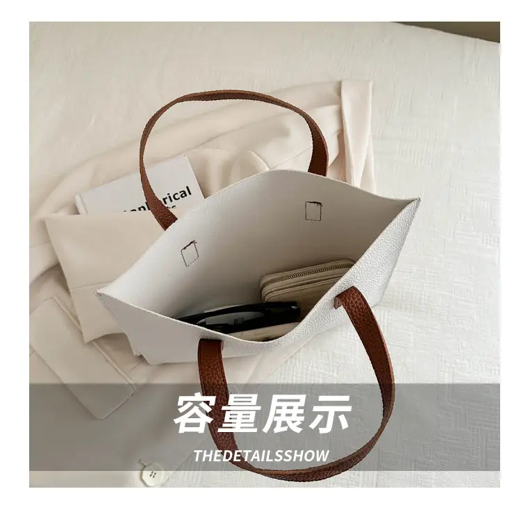 Black Leather Shoulder Bag with Brown Handles — feature 5