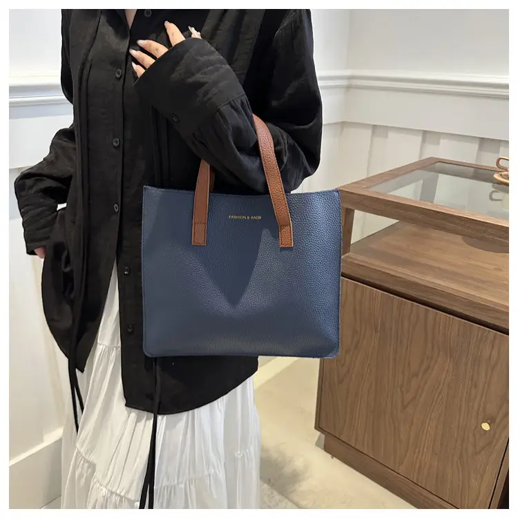 Black Leather Shoulder Bag with Brown Handles — feature 7