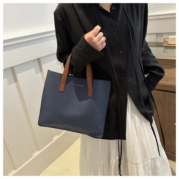 Black Leather Shoulder Bag with Brown Handles — feature 8