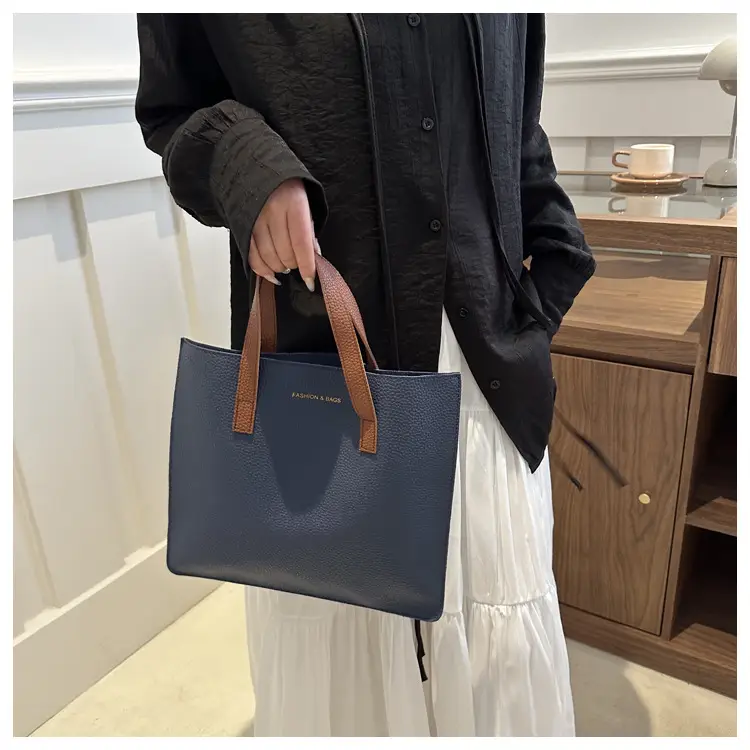 Black Leather Shoulder Bag with Brown Handles — feature 9