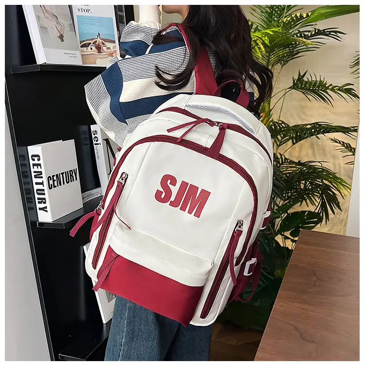 Blue White Student Backpack with "SIM" Print — feature 15