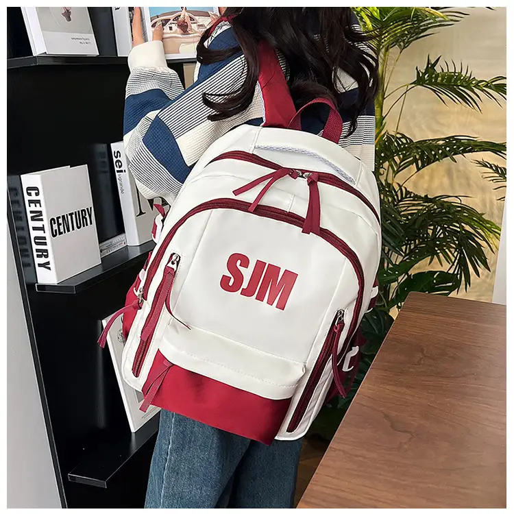 Blue White Student Backpack with "SIM" Print — feature 16