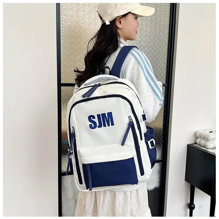 Blue White Student Backpack with "SIM" Print — feature 19