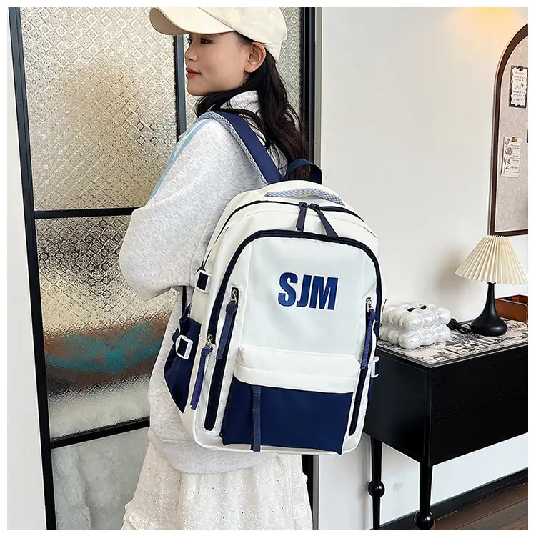 Blue White Student Backpack with "SIM" Print — feature 24