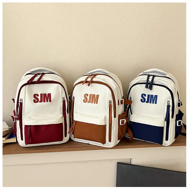 Blue White Student Backpack with "SIM" Print — feature 35