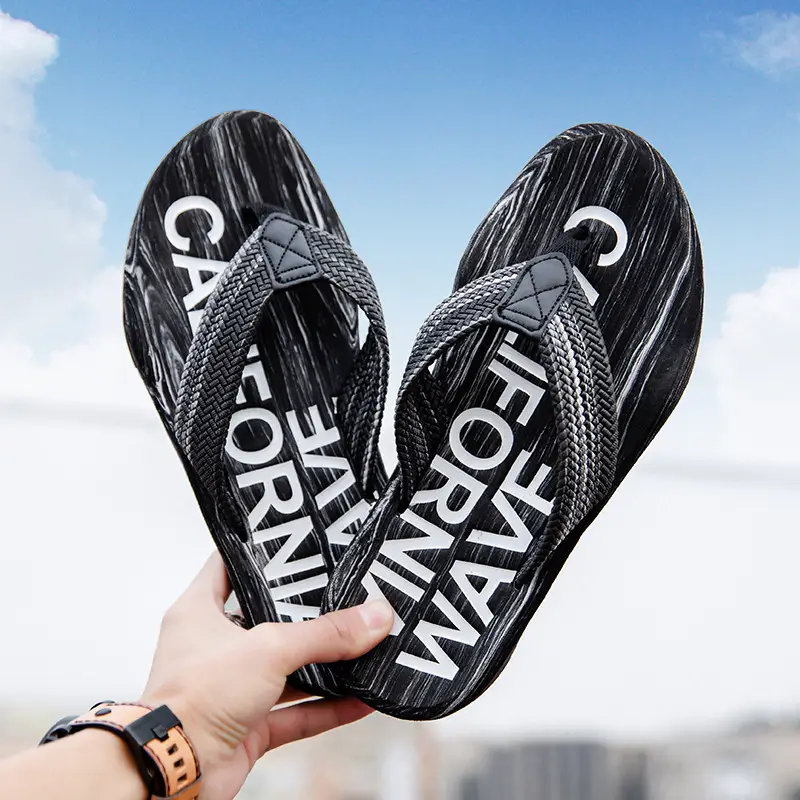 Cross-border men's flip-flops men's sense of stepping on excrement high-end summer non-slip outer wear thick bottom beach seaside plus size 47 Guangdong