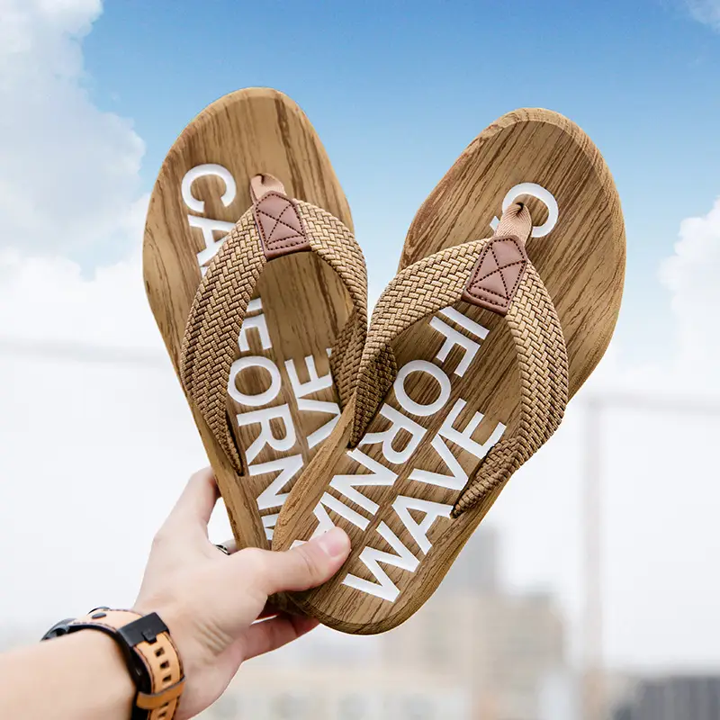 Cross-border men's flip-flops men's sense of stepping on excrement high-end summer non-slip outer wear thick bottom beach seaside plus size 47 Guangdong
