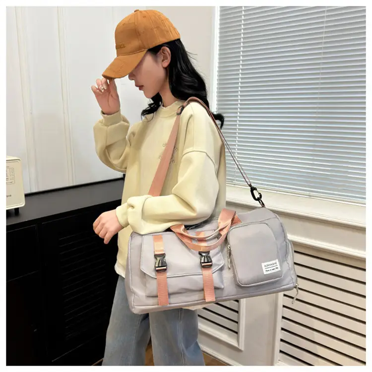 Pink Women's Sports Travel Bag with Water Repellent Design — feature 39