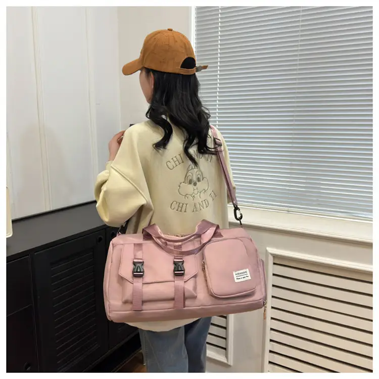 Pink Women's Sports Travel Bag with Water Repellent Design — feature 40