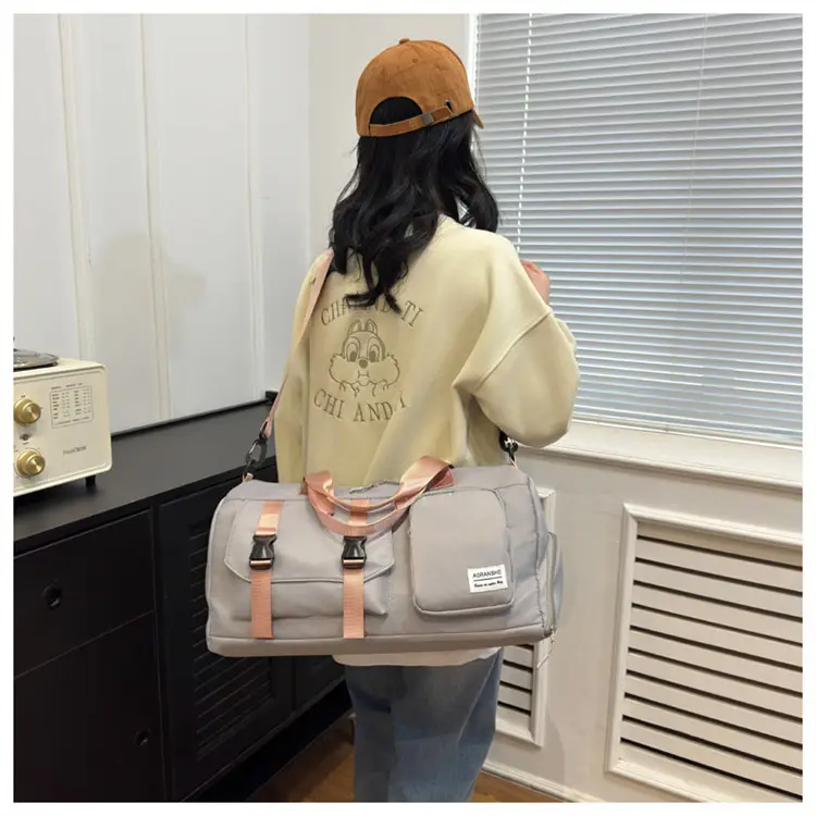 Pink Women's Sports Travel Bag with Water Repellent Design — feature 7