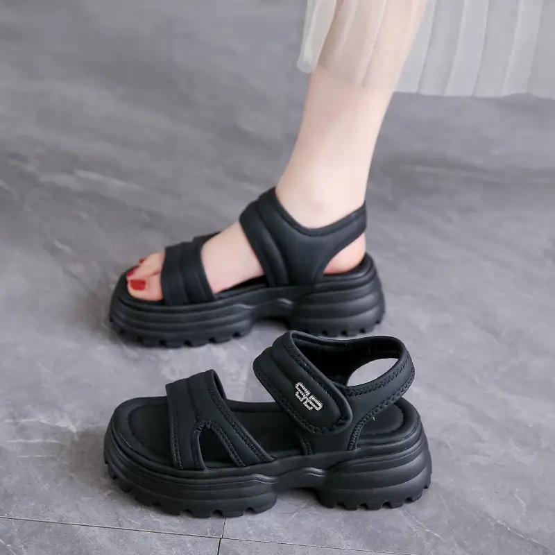 Net red muffin thick-soled sandals women's summer wholesale new casual Roman beach shoes increased all-match explosions for the little man