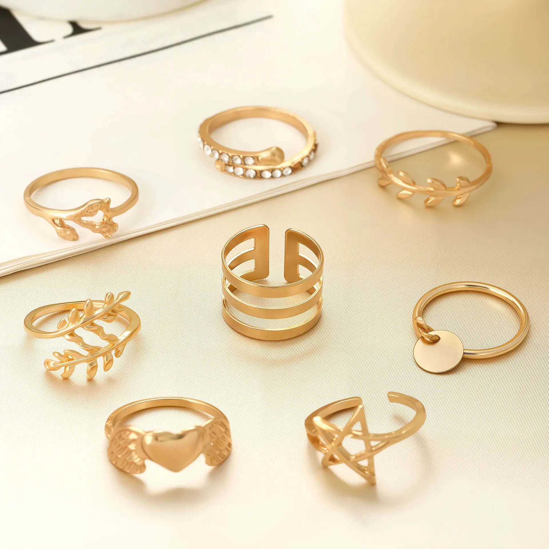 10-Piece Gold Plated Ring Set with Heart, Leaf, Star & Rhinestones - Image 4