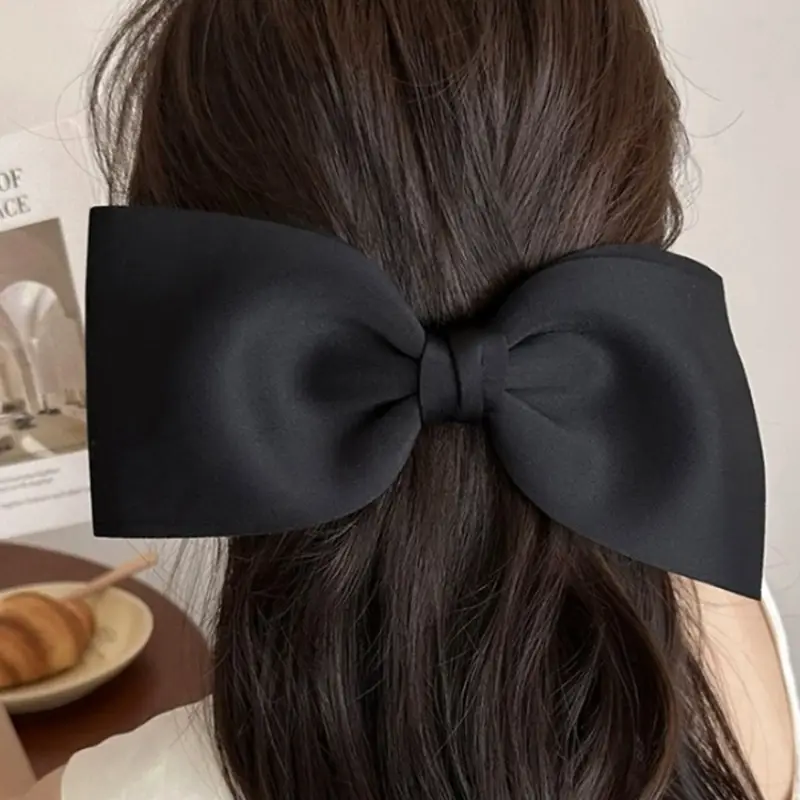 Oversized Pink Bow Hair Clip with Duckbill Design — feature 1